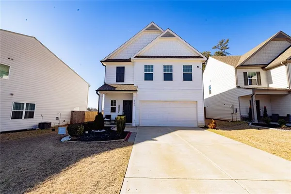 a front view of a house with a patio
