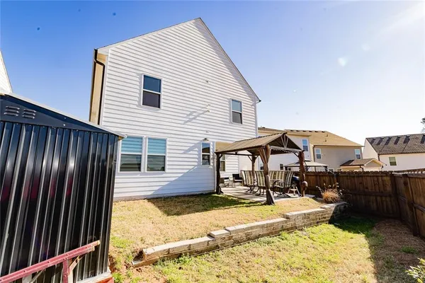 a view of a house with a patio