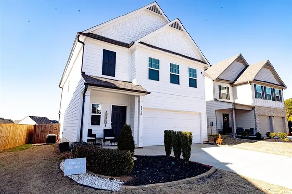 a front view of a house with entertaining space