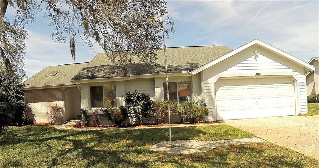 4250 Cavehill Road Spring Hill, FL 34606 - Photo 1 of 1 Front of home... on a quiet well maintained street