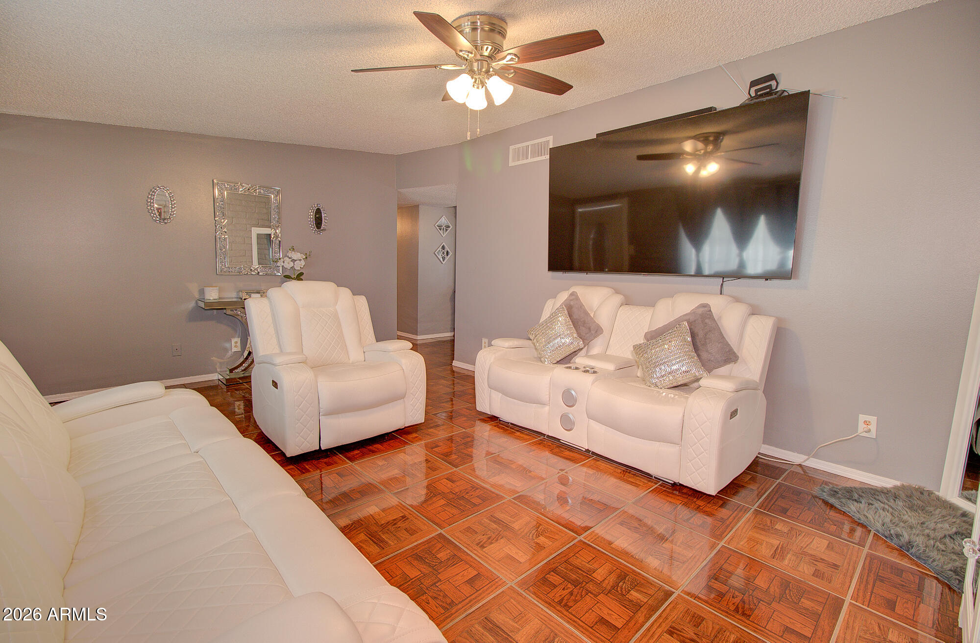 101 East 7th Street Eloy, AZ 85131 - Photo 13 of 34 a living room with furniture and a flat screen tv