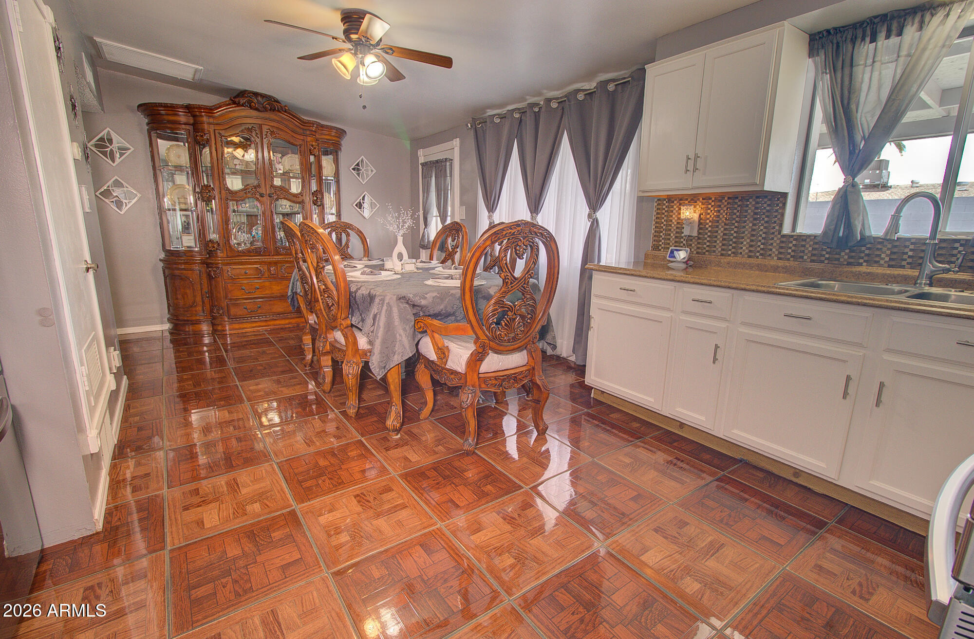 101 East 7th Street Eloy, AZ 85131 - Photo 16 of 34 a view of a dining room with furniture and a chandelier