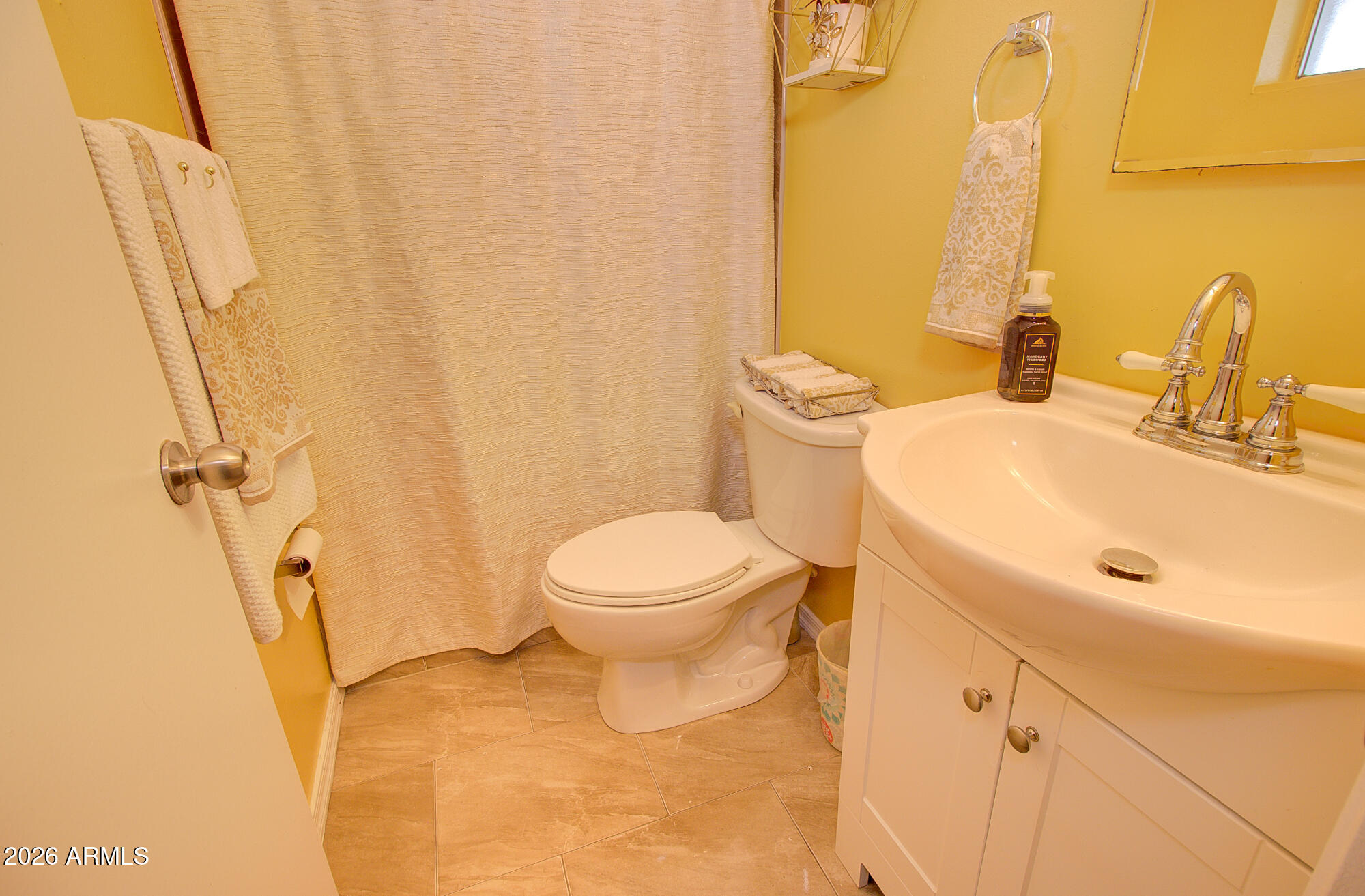 101 East 7th Street Eloy, AZ 85131 - Photo 19 of 34 a bathroom with a sink and a toilet