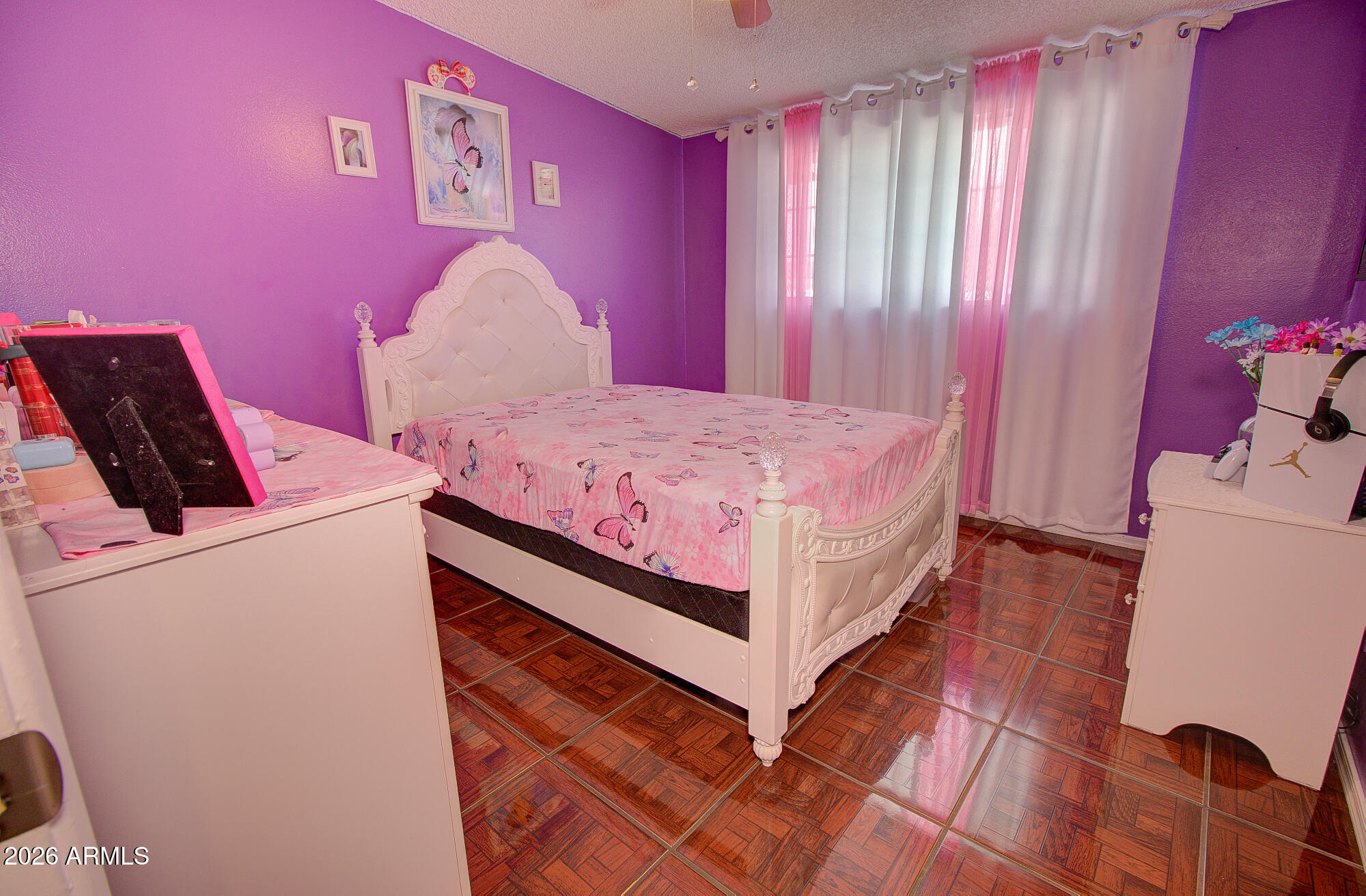 101 East 7th Street Eloy, AZ 85131 - Photo 21 of 34 a bedroom with a bed and a window