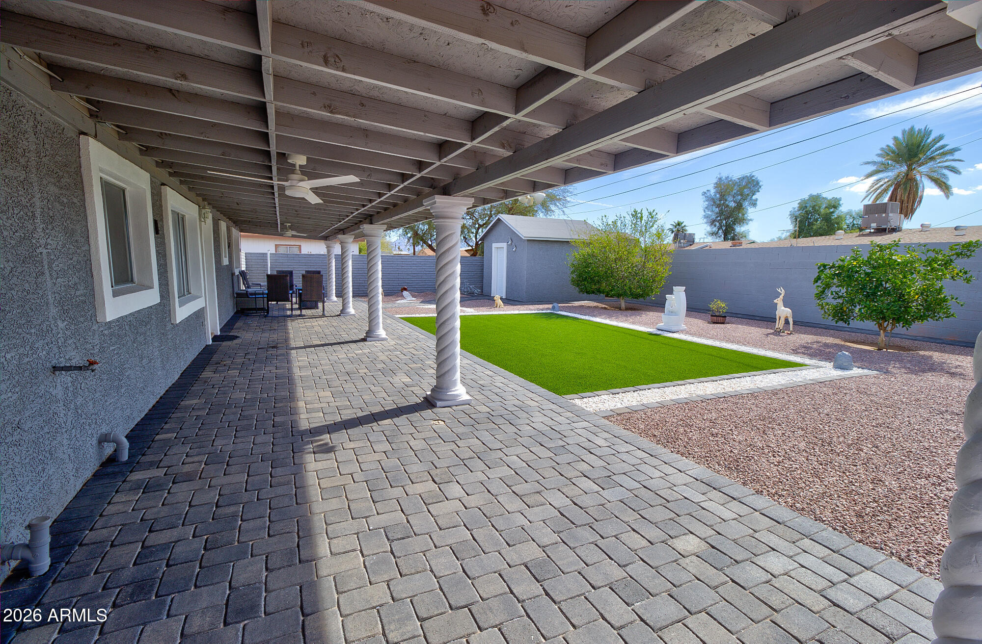 101 East 7th Street Eloy, AZ 85131 - Photo 25 of 34 a view of a backyard with a patio
