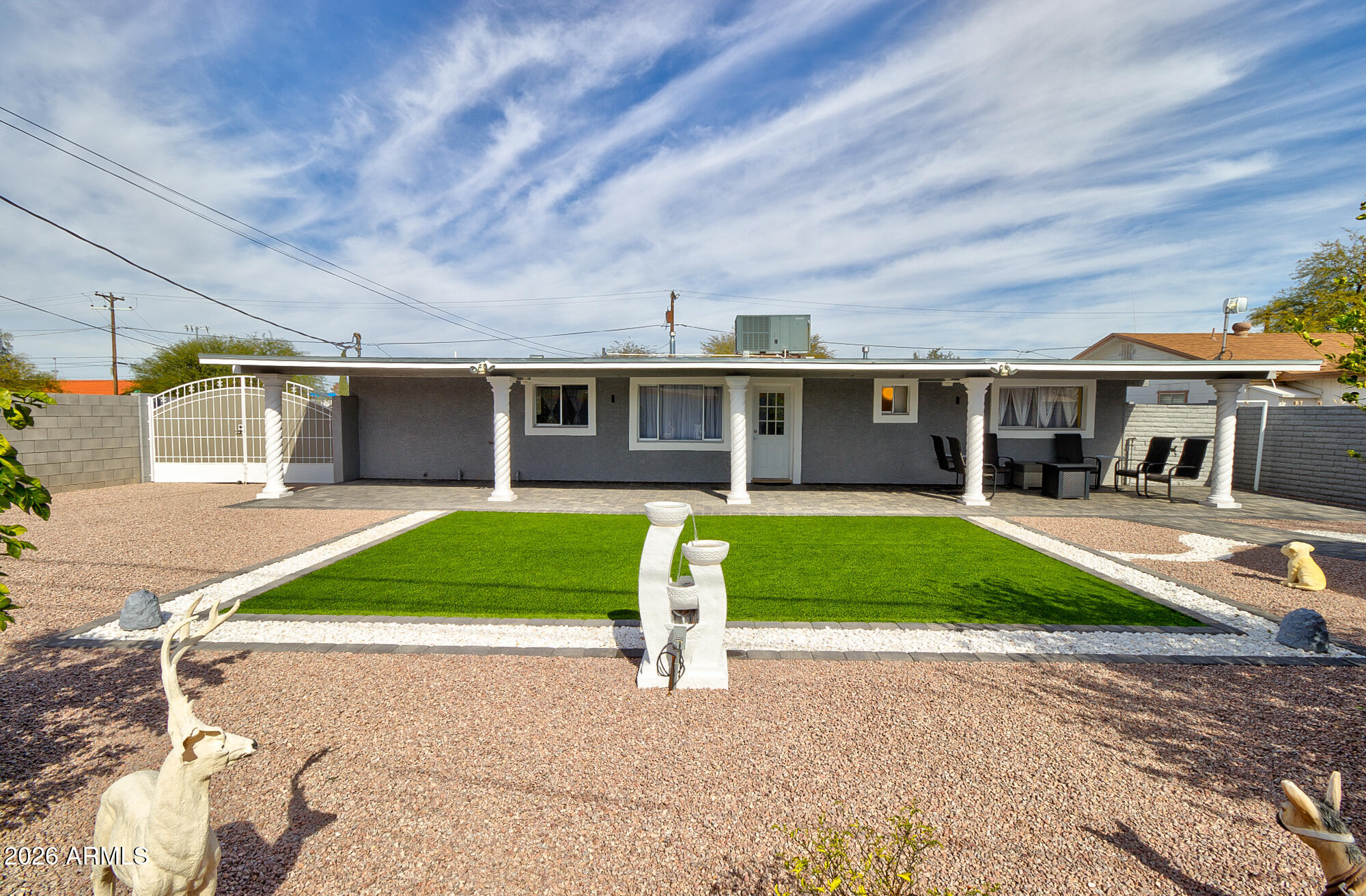 101 East 7th Street Eloy, AZ 85131 - Photo 28 of 34 front view of a house with a yard