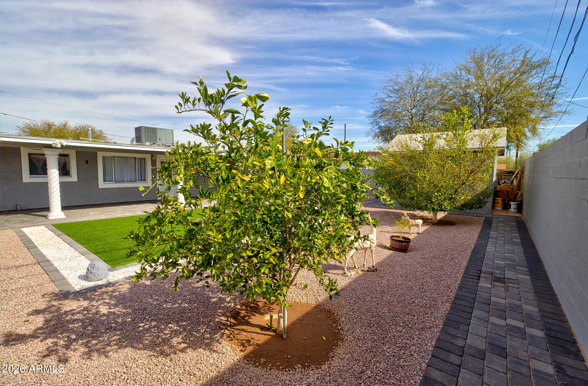 101 East 7th Street Eloy, AZ 85131 - Photo 30 of 34 a view of a garden with pathway