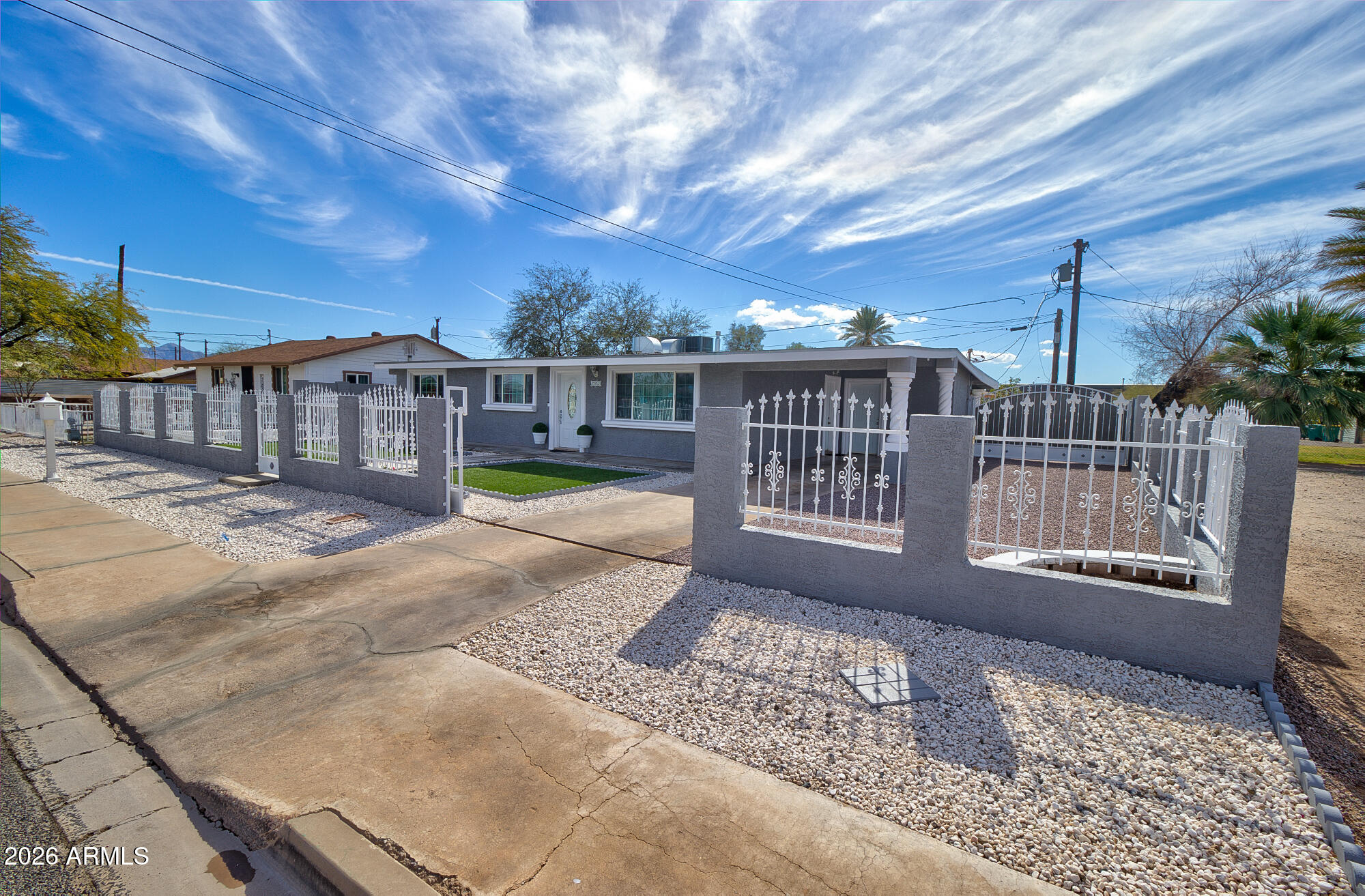 101 East 7th Street Eloy, AZ 85131 - Photo 4 of 34 a view of a house with a wooden deck