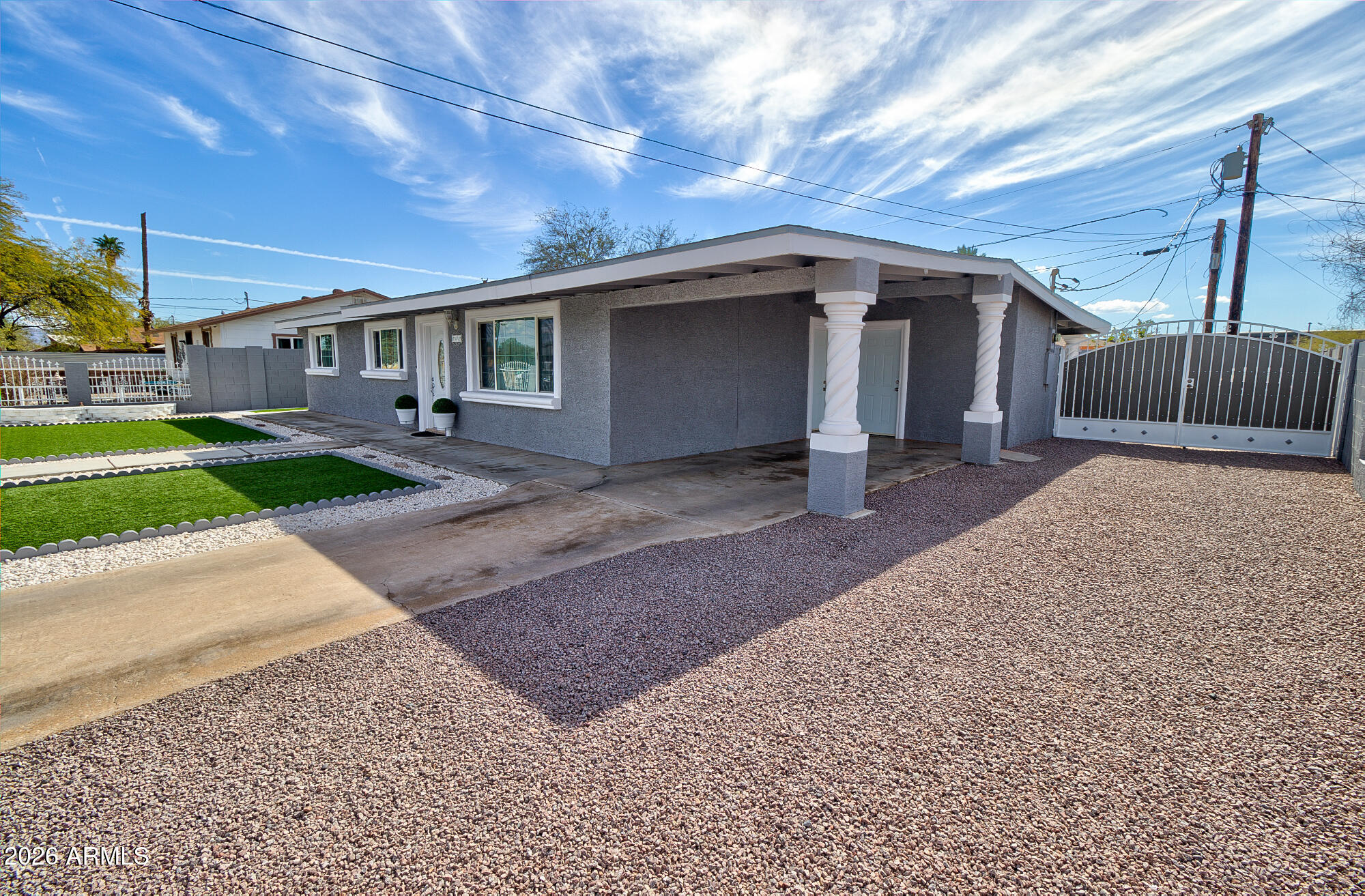 101 East 7th Street Eloy, AZ 85131 - Photo 5 of 34 a front view of a house with garden