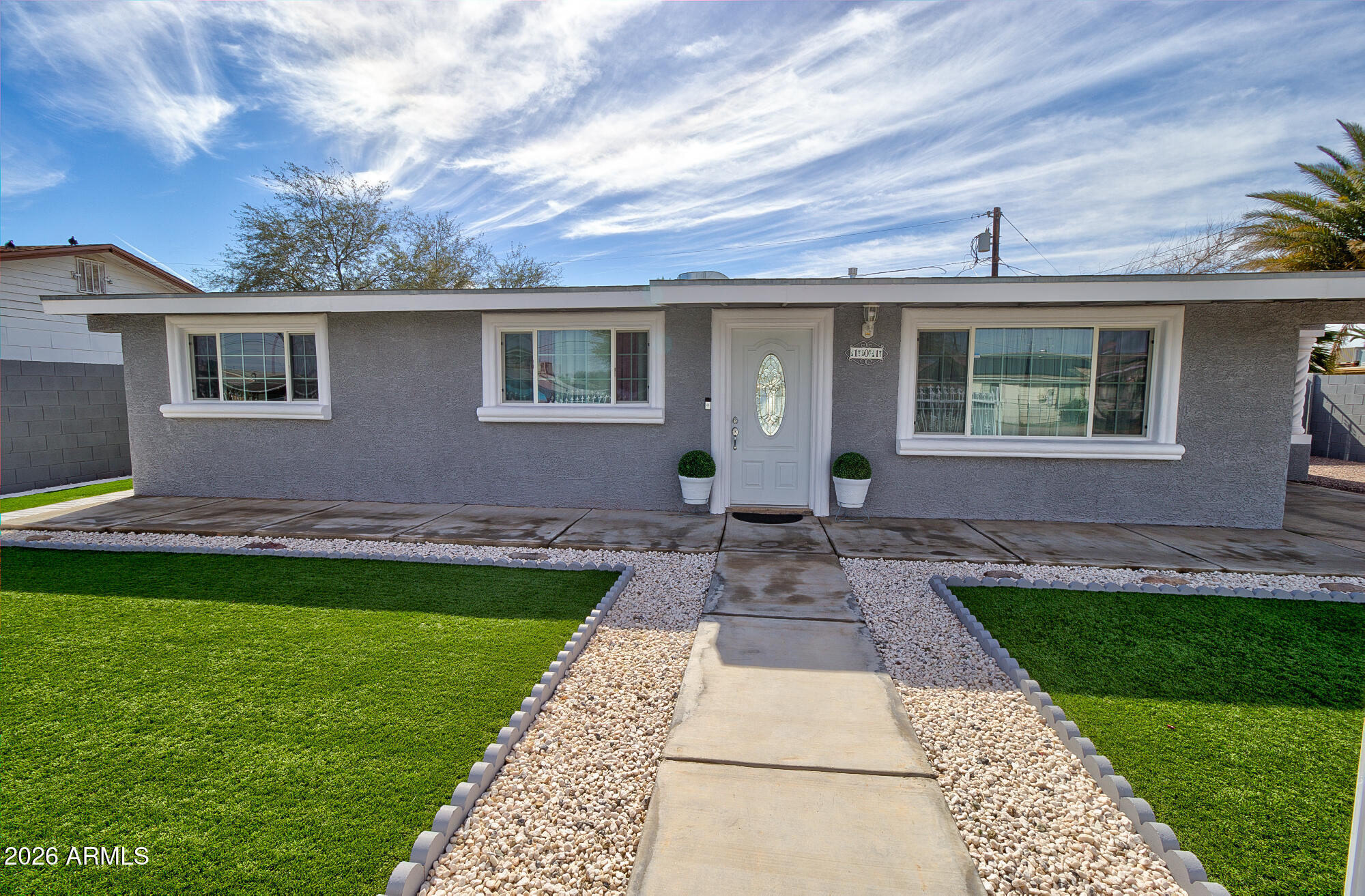 101 East 7th Street Eloy, AZ 85131 - Photo 8 of 34 a front view of house with yard