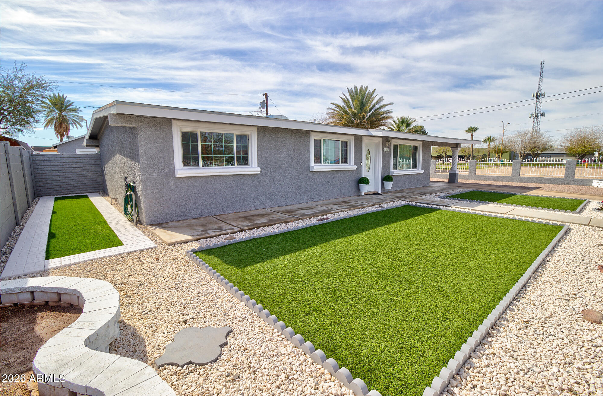 101 East 7th Street Eloy, AZ 85131 - Photo 9 of 34 a backyard of a house with table and chairs