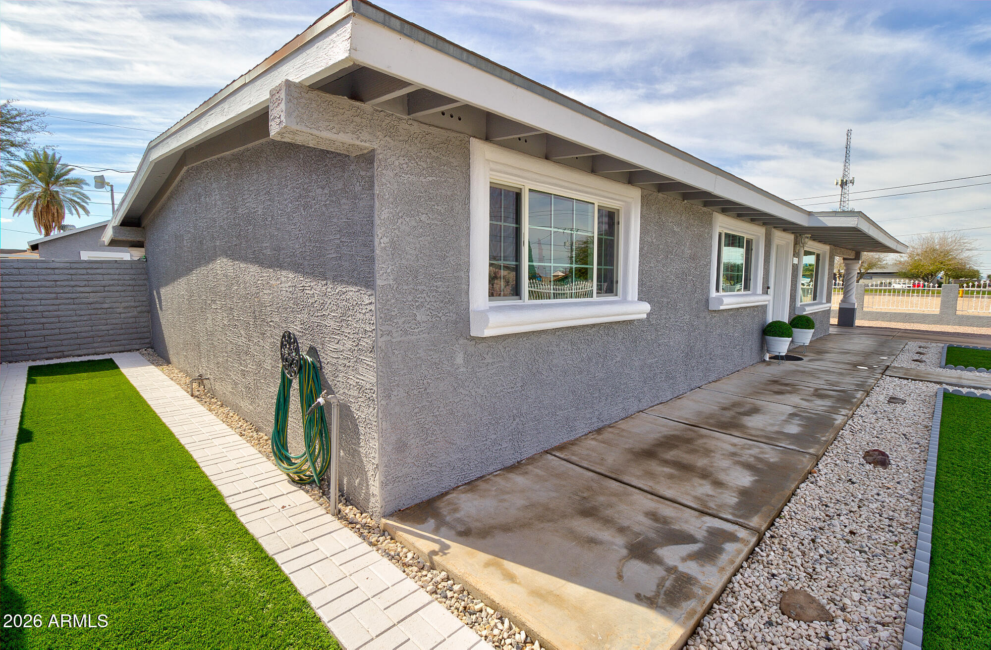 101 East 7th Street Eloy, AZ 85131 - Photo 10 of 34 a front view of a house with a yard