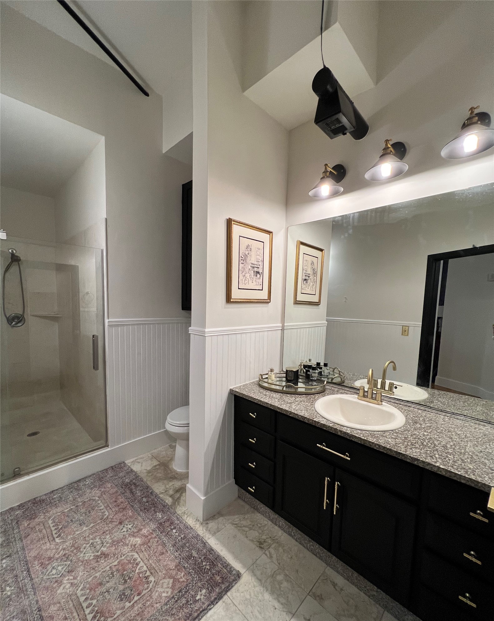 705 Main Street, Unit 311 Houston, TX 77002 - Photo 14 of 23 Recently renovated full bath with generous counter space and oversized shower.