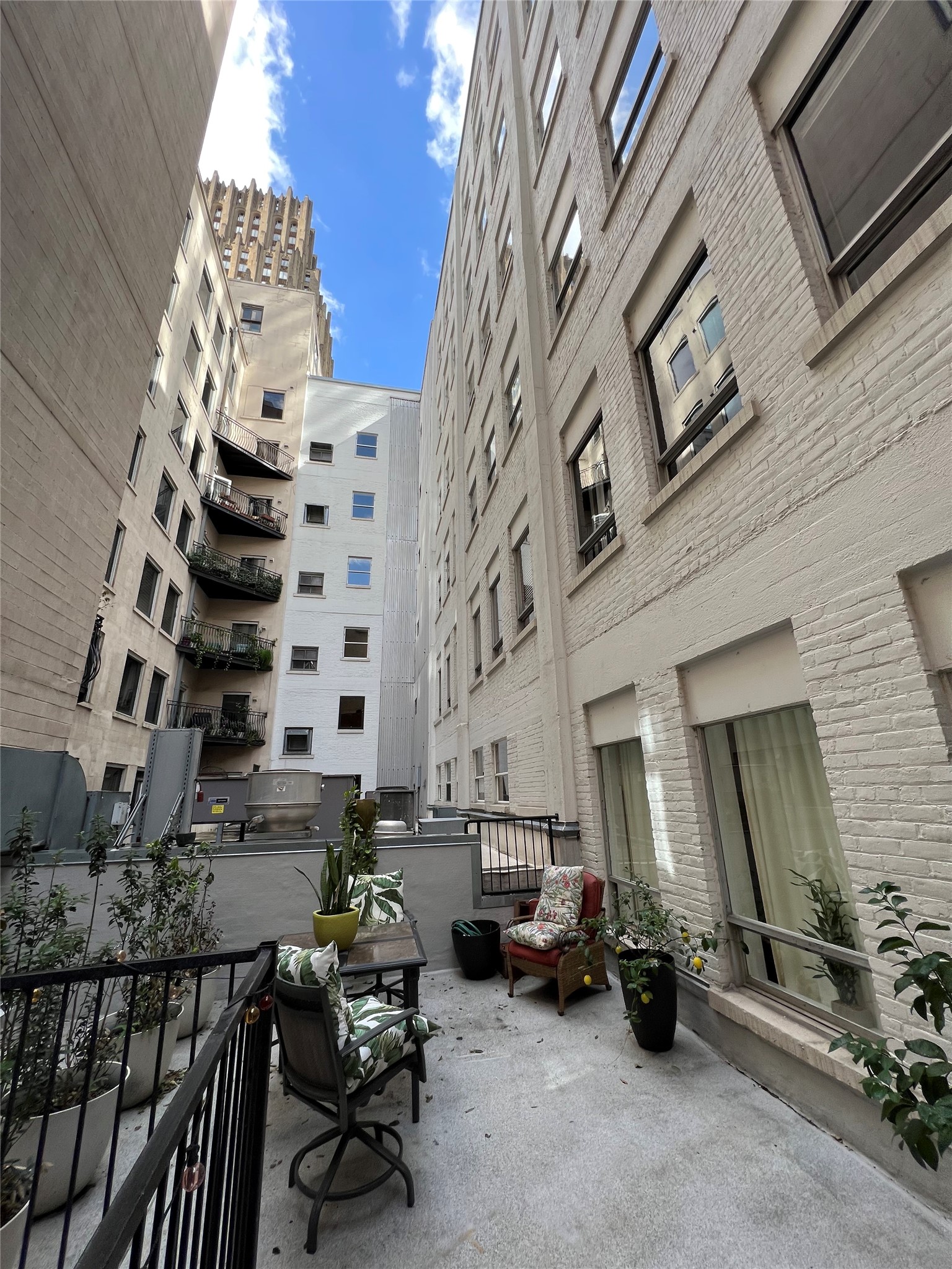 705 Main Street, Unit 311 Houston, TX 77002 - Photo 15 of 23 Step out on to your terrace with an amazing outdoor entertaining space