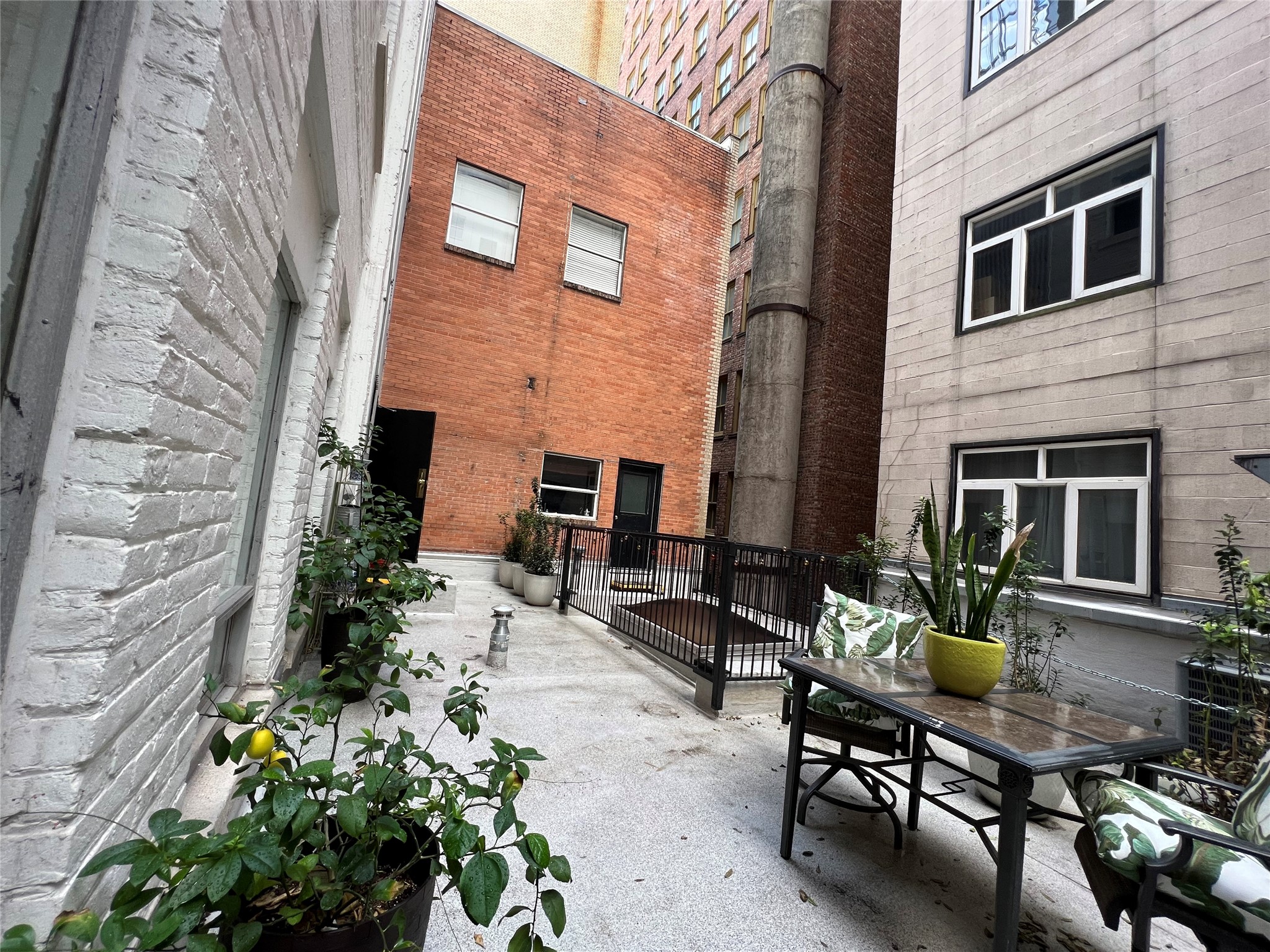 705 Main Street, Unit 311 Houston, TX 77002 - Photo 16 of 23 This unit included access to a terrace.