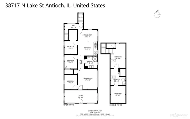 a front view of a house with a garden and plants