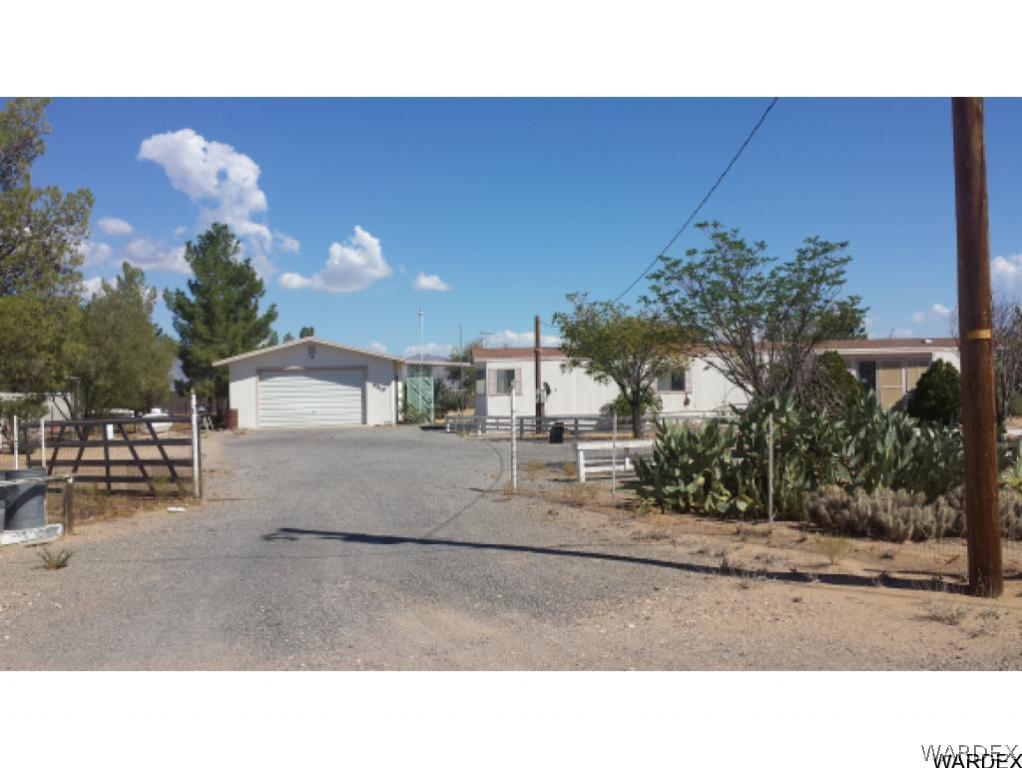 4110 Concho Road Golden Valley, AZ 86413 - Photo 1 of 10 a black and white photo of a house