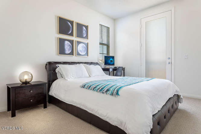 239 Stonegate Road Camarillo, CA 93010 - Photo 14 of 25 a bedroom with a bed and painting on the wall