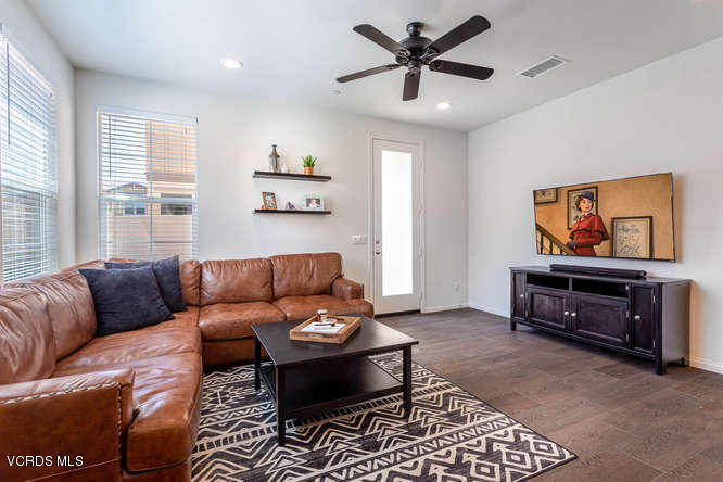 239 Stonegate Road Camarillo, CA 93010 - Photo 6 of 25 a living room with furniture and a flat screen tv
