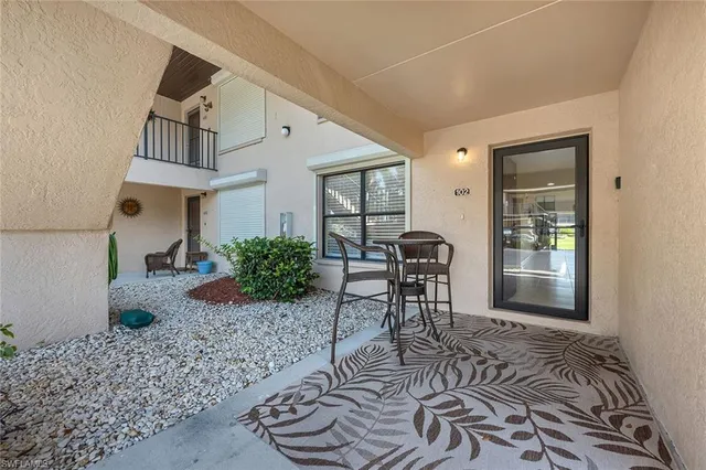 a view of a livingroom with furniture and a rug
