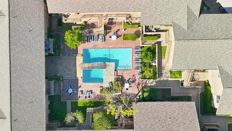 swimming pool view with outdoor seating