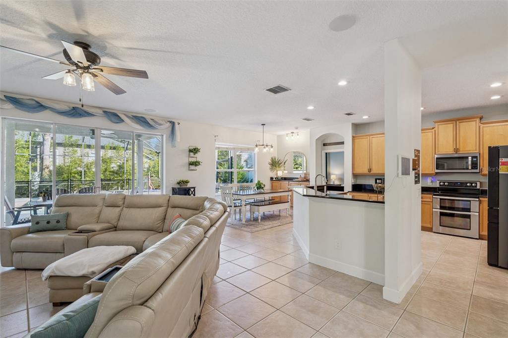 1471 Wescott Loop Winter Springs, FL 32708 - Photo 11 of 57 a living room with furniture and a large window