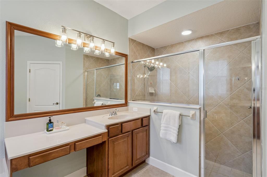 1471 Wescott Loop Winter Springs, FL 32708 - Photo 31 of 57 a bathroom with a sink double vanity and a mirror