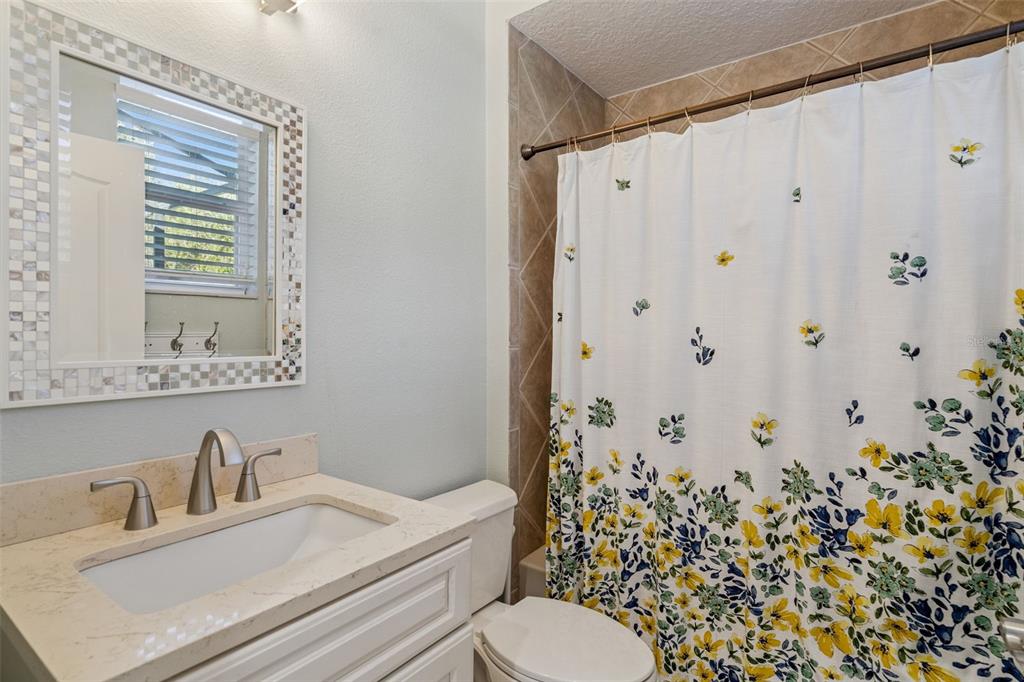 1471 Wescott Loop Winter Springs, FL 32708 - Photo 34 of 57 a bathroom with a sink toilet and shower