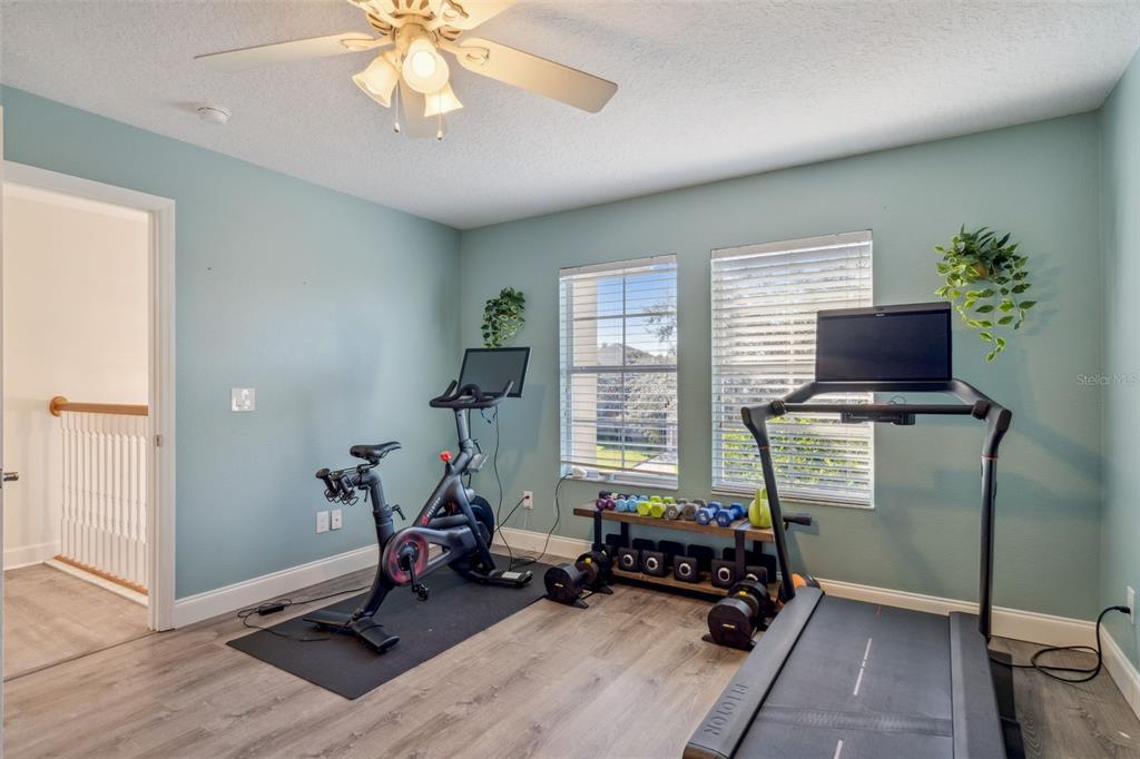 1471 Wescott Loop Winter Springs, FL 32708 - Photo 35 of 57 a room with furniture and a window