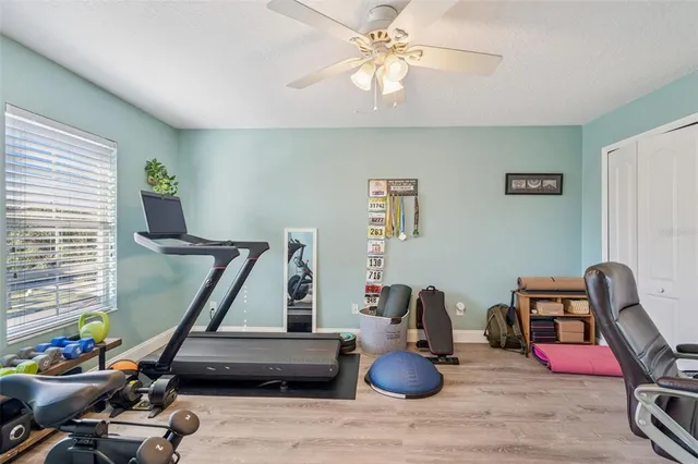 a view of a swimming pool with sitting area