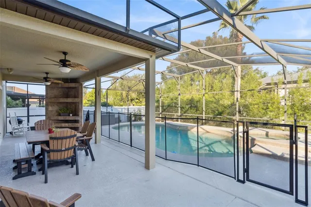 a view of a swimming pool with a porch