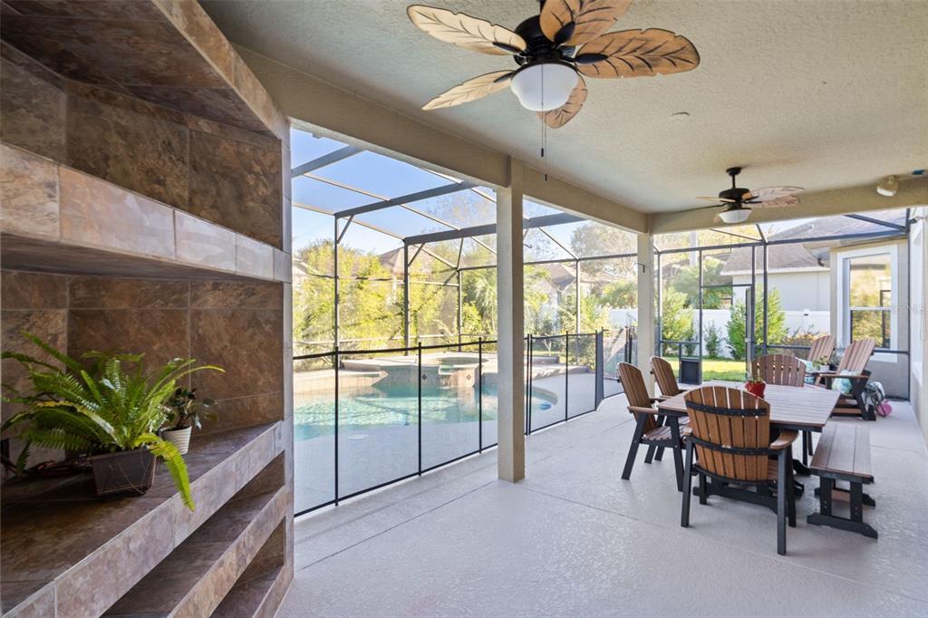 1471 Wescott Loop Winter Springs, FL 32708 - Photo 40 of 57 a view of a dining room with furniture window and outside view