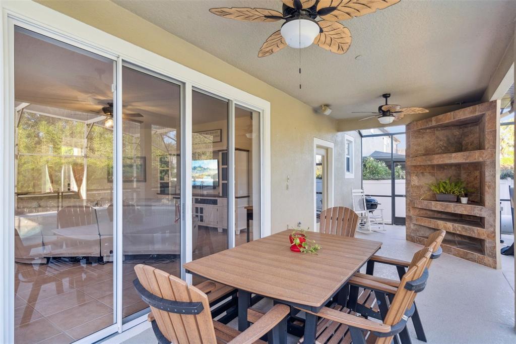 1471 Wescott Loop Winter Springs, FL 32708 - Photo 47 of 57 a view of a dining room with furniture window and wooden floor
