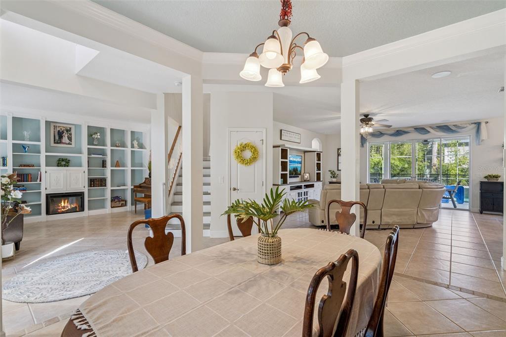1471 Wescott Loop Winter Springs, FL 32708 - Photo 5 of 57 a view of a dining room with furniture and chandelier