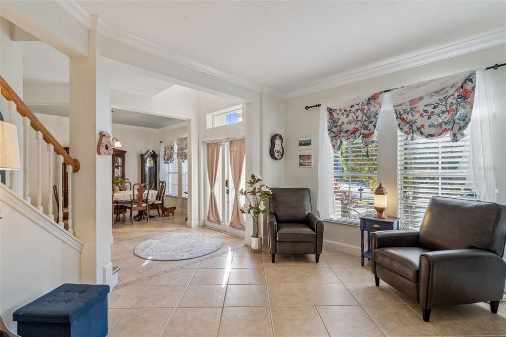 1471 Wescott Loop Winter Springs, FL 32708 - Photo 7 of 57 a living room with furniture and a large window
