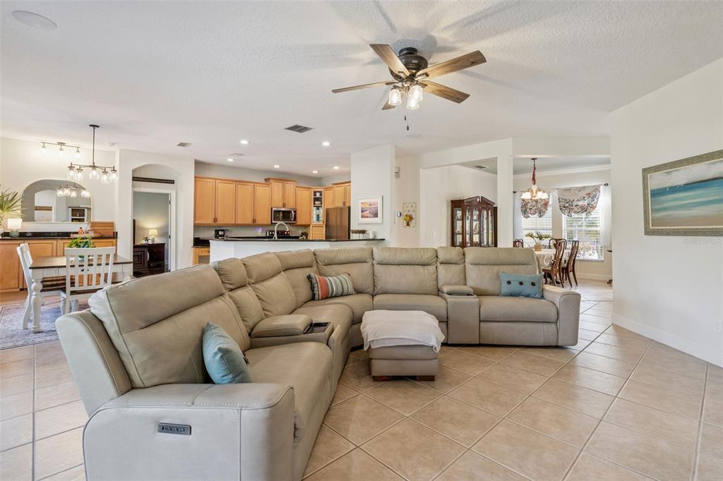 1471 Wescott Loop Winter Springs, FL 32708 - Photo 8 of 57 a living room with furniture and a view of kitchen