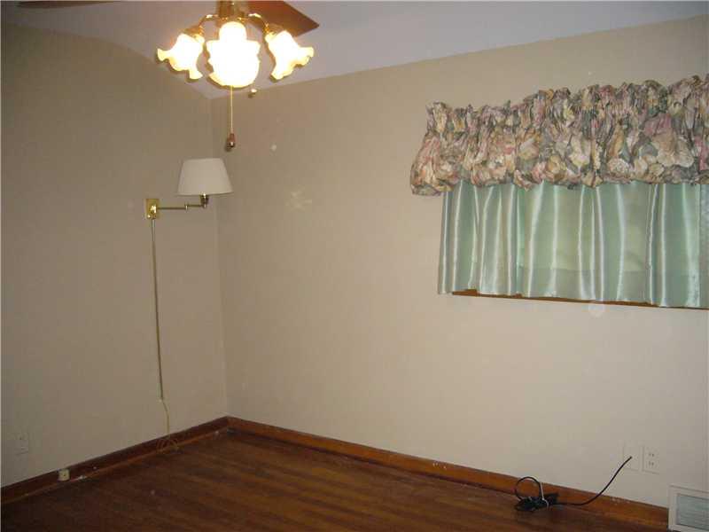 435 Tuscarawas Road Beaver, PA 15009 - Photo 8 of 16 Bedroom. Second bedroom with two windows large closet and hardwood floors.