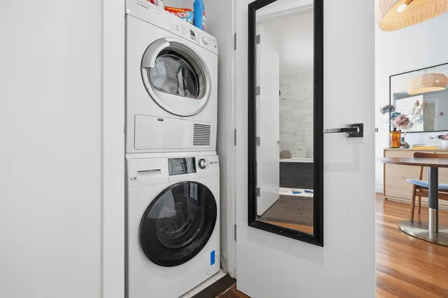 a kitchen with stainless steel appliances a microwave a stove and refrigerator