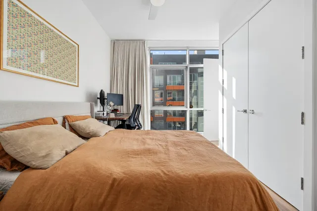 a living room with fireplace furniture and a flat screen tv