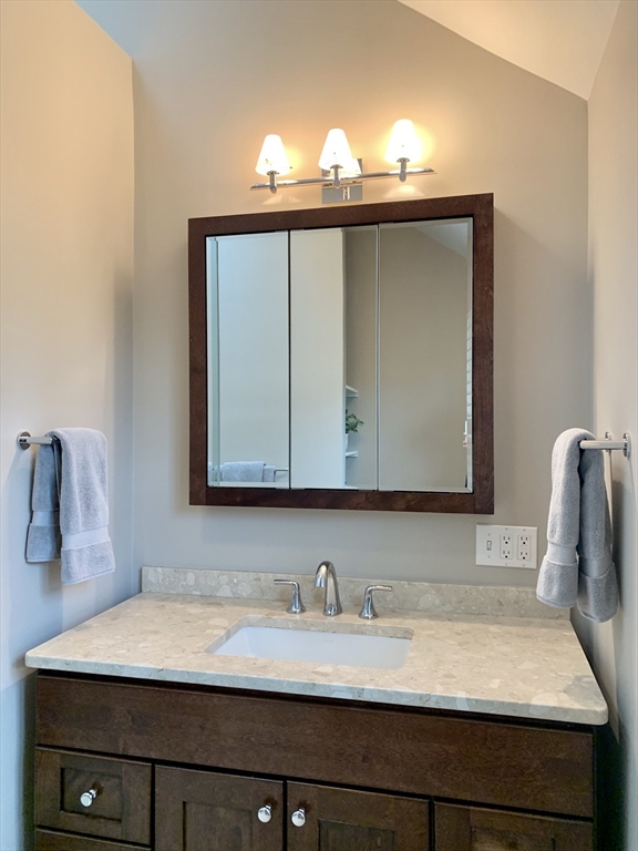 31 Bubier Road Marblehead, MA 01945 - Photo 16 of 29 a bathroom with a sink and a mirror