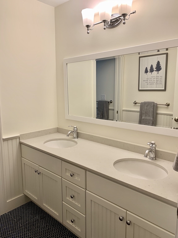 31 Bubier Road Marblehead, MA 01945 - Photo 22 of 29 a bathroom with a sink and a mirror