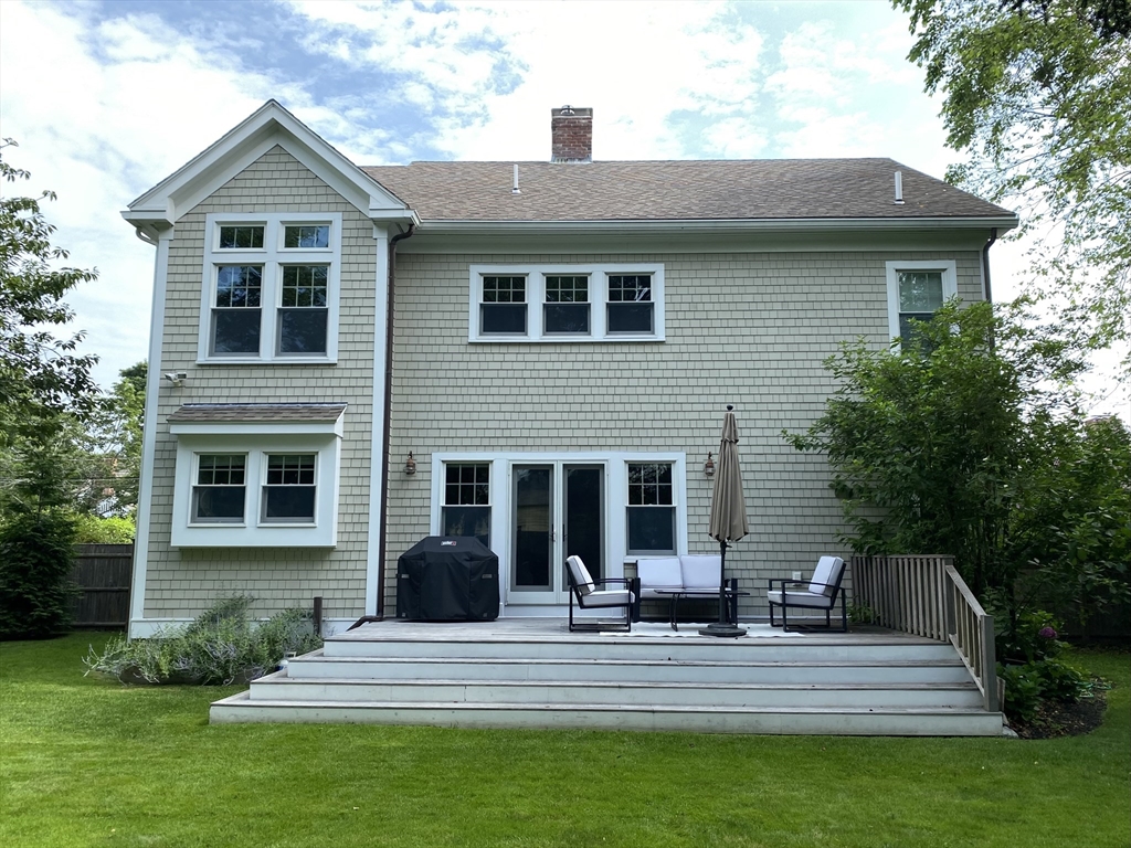 31 Bubier Road Marblehead, MA 01945 - Photo 27 of 29 a view of a house with a yard and plants