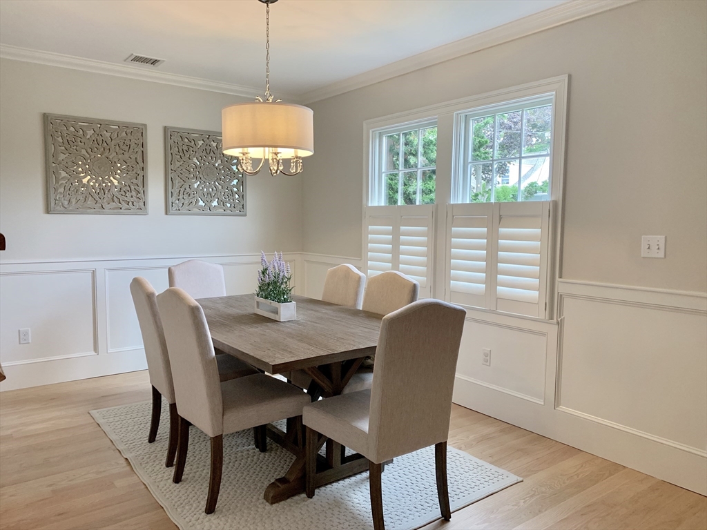 31 Bubier Road Marblehead, MA 01945 - Photo 10 of 29 a view of a dining room with furniture window and wooden floor