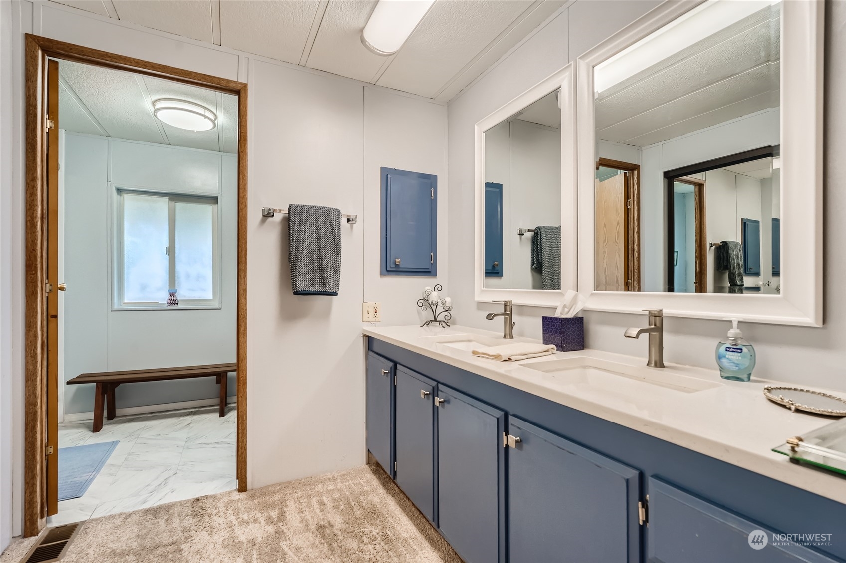 2500 South 370th Street, Unit 196 Federal Way, WA 98003 - Photo 20 of 29 a bathroom with a sink and a mirror