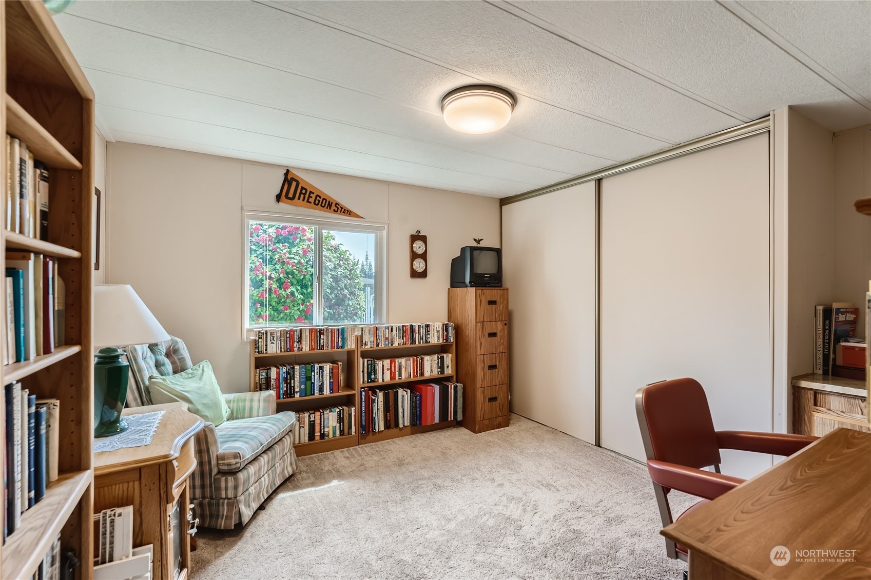 2500 South 370th Street, Unit 196 Federal Way, WA 98003 - Photo 22 of 29 a bedroom with furniture and a window