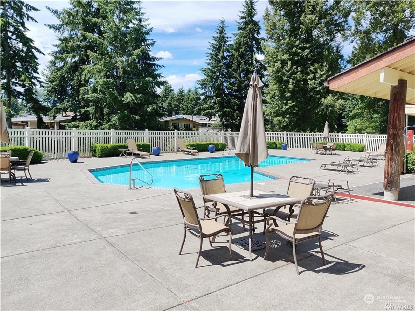 2500 South 370th Street, Unit 196 Federal Way, WA 98003 - Photo 29 of 29 a view of a patio with a table and chairs