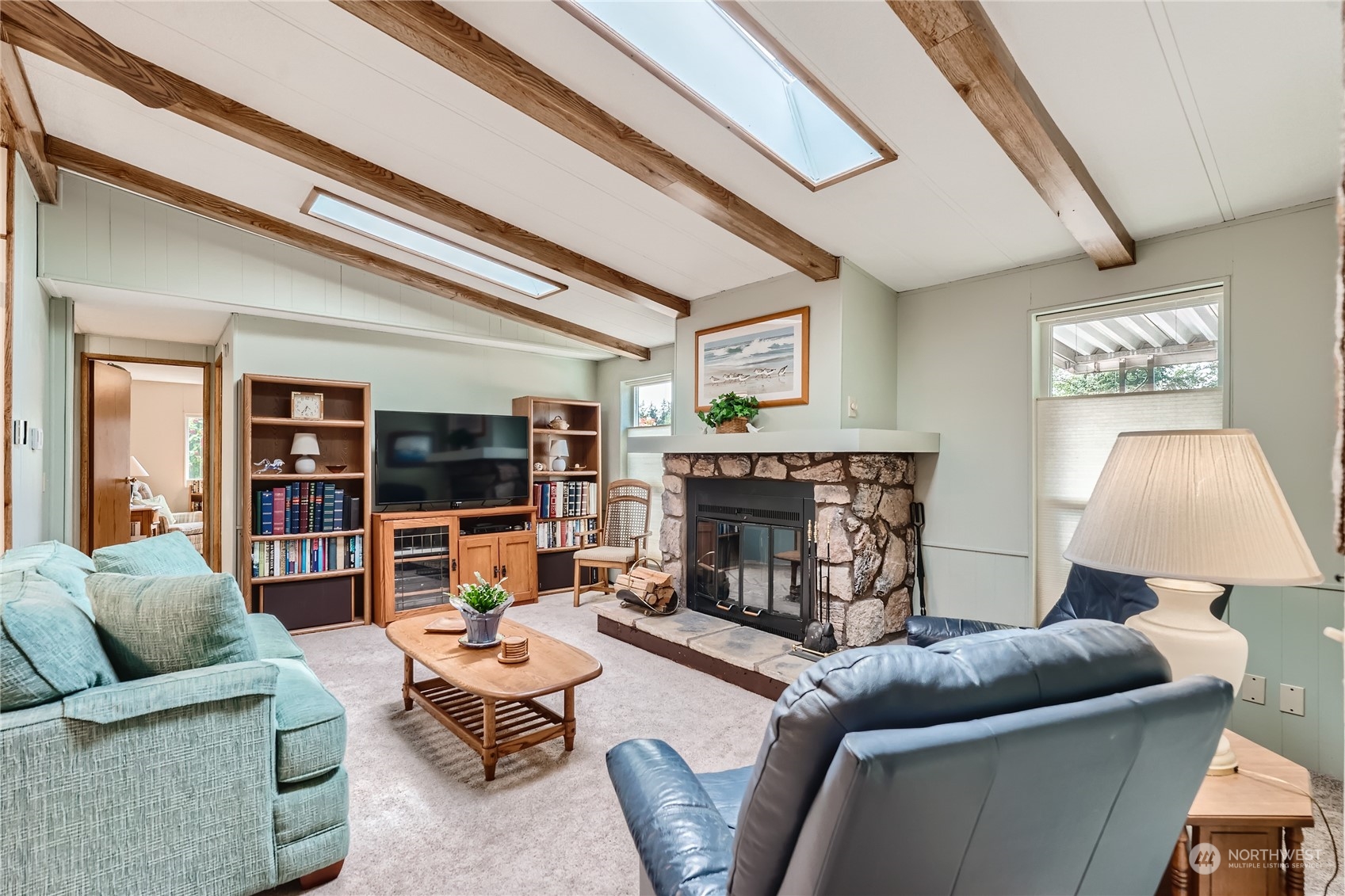 2500 South 370th Street, Unit 196 Federal Way, WA 98003 - Photo 5 of 29 a living room with furniture and a fireplace