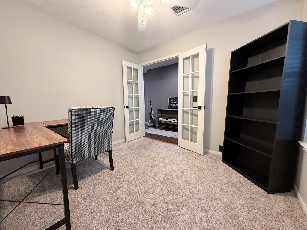 11903 Ezekiel Road Tomball, TX 77375 - Photo 15 of 39 a view of a workspace with furniture