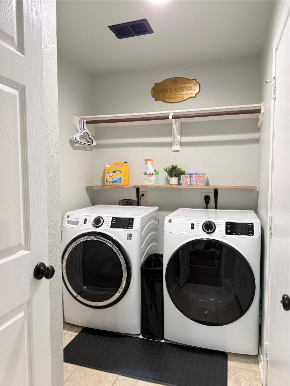 11903 Ezekiel Road Tomball, TX 77375 - Photo 18 of 39 a utility room with dryer and washer