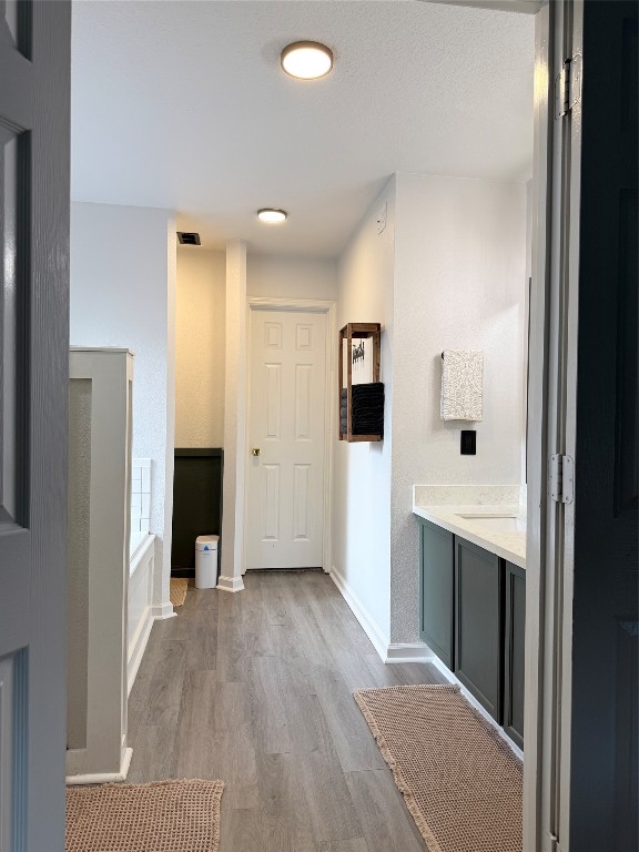 11903 Ezekiel Road Tomball, TX 77375 - Photo 22 of 39 a view of kitchen with a sink refrigerator and wooden floor